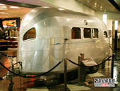 2009(gu)ӡڰ{(j)܇չ(hu)ͣ